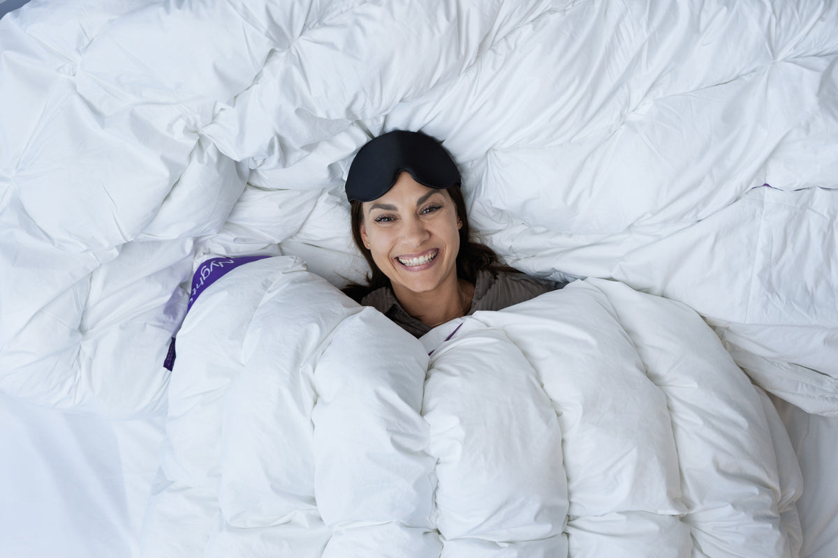 Smilende kvinde under Hybridduvet